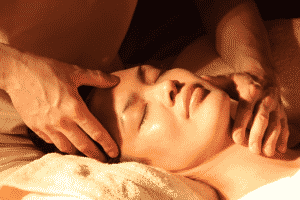 A woman receiving acupressure
