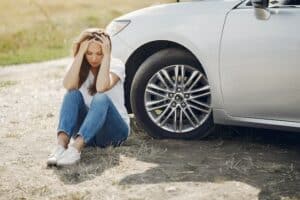 Frustrated woman after a car accident